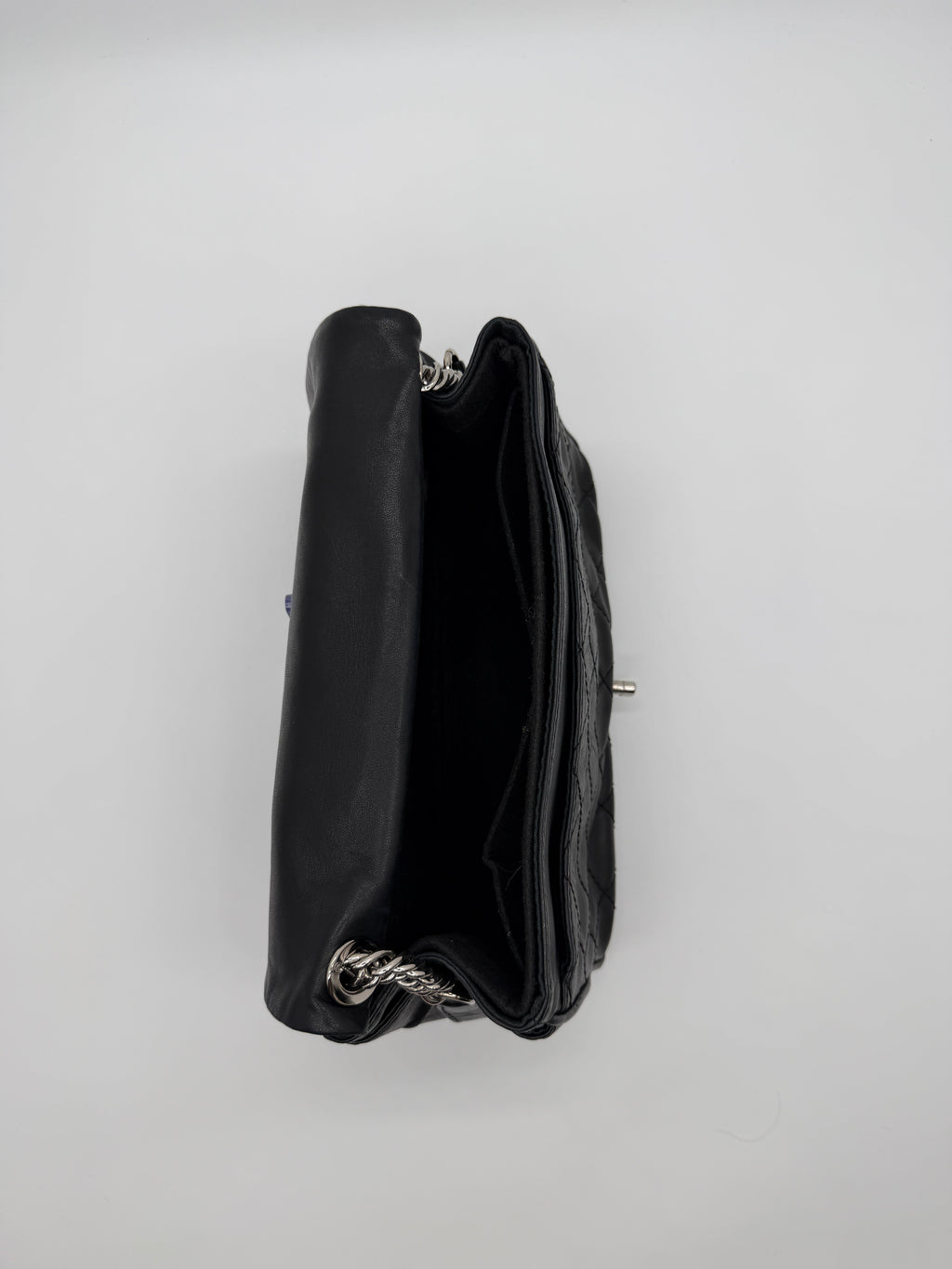 Chanel Secret Flap in Black Lambskin