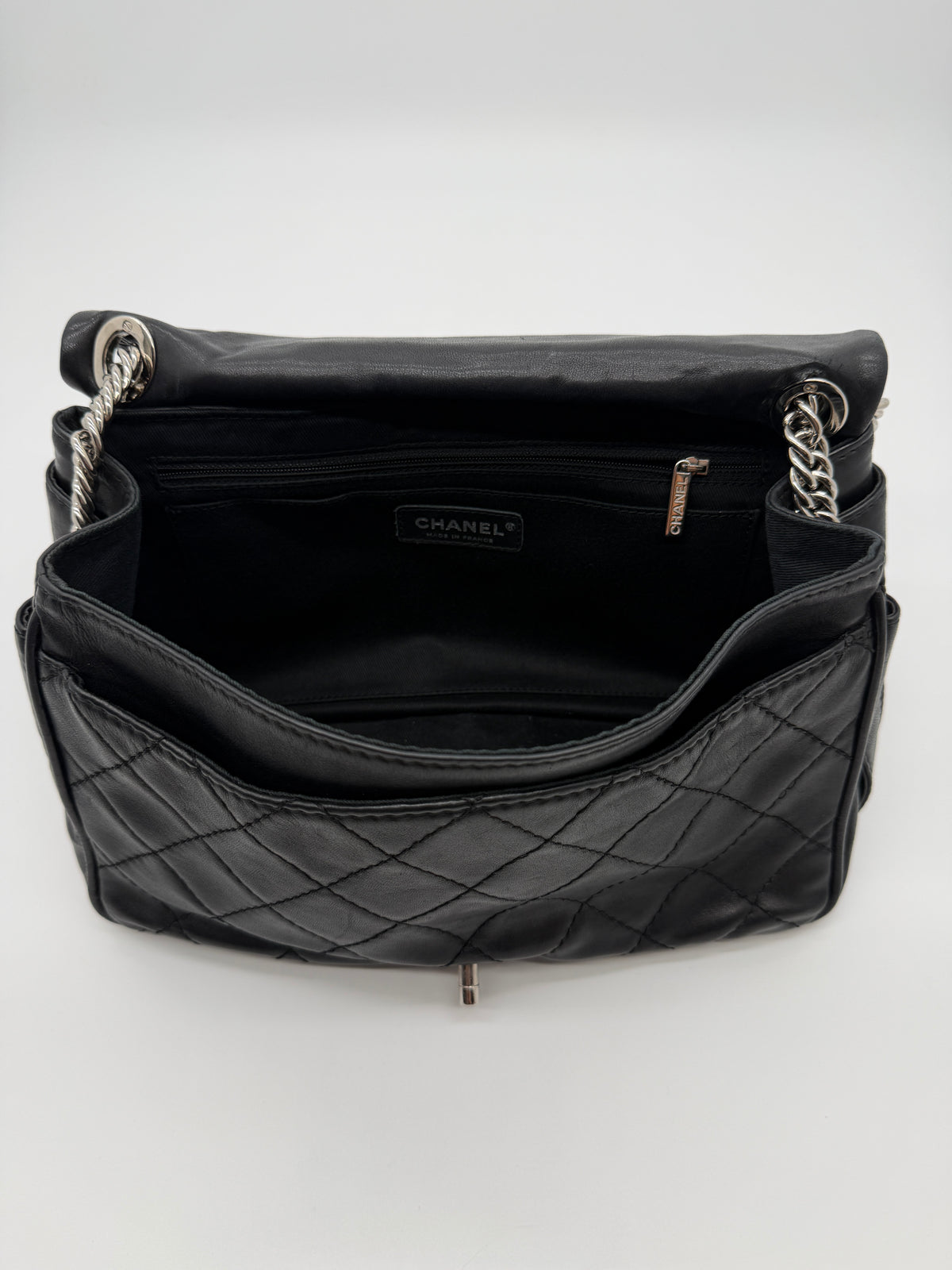 Chanel Secret Flap in Black Lambskin