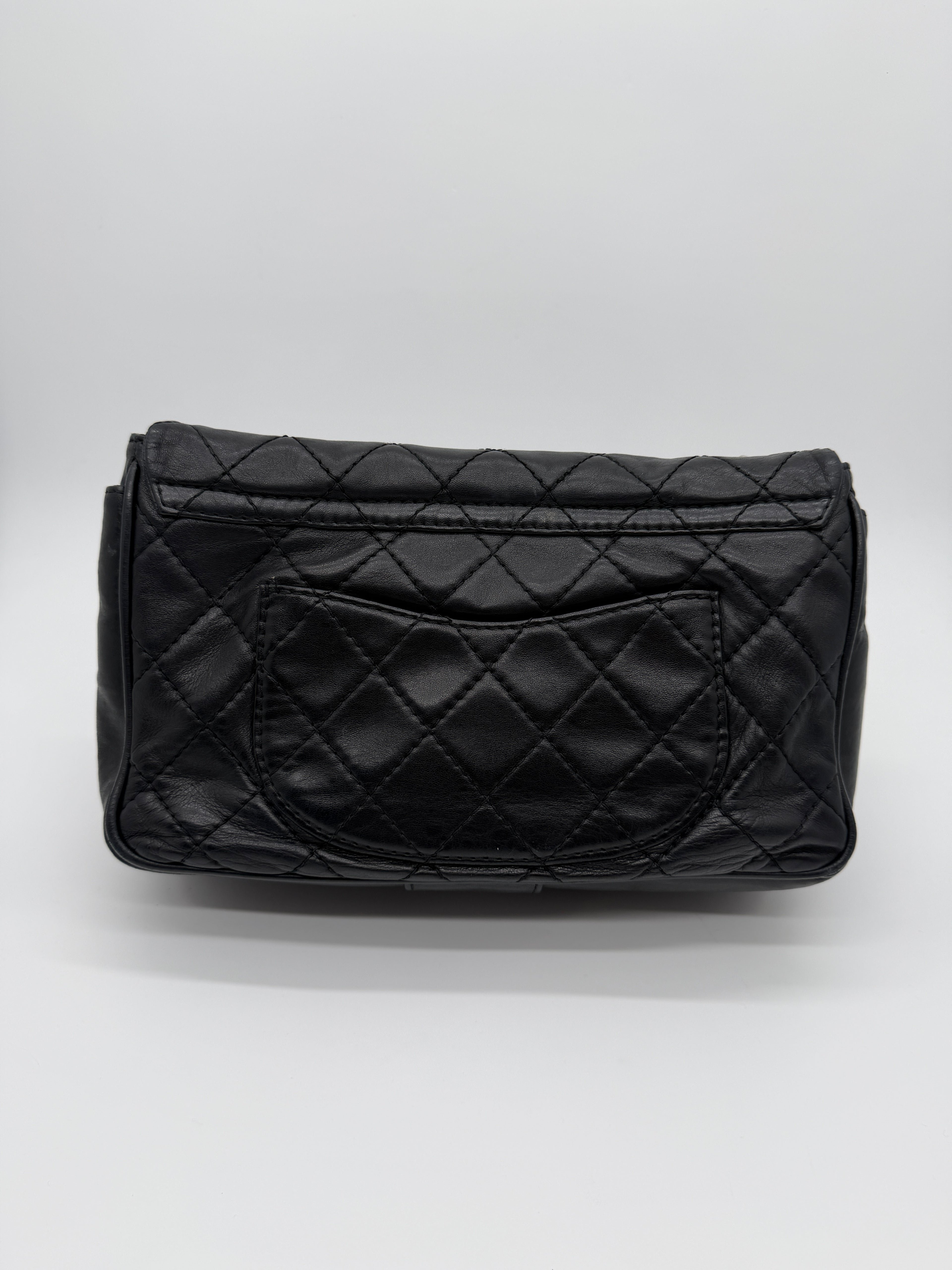 Chanel Secret Flap in Black Lambskin