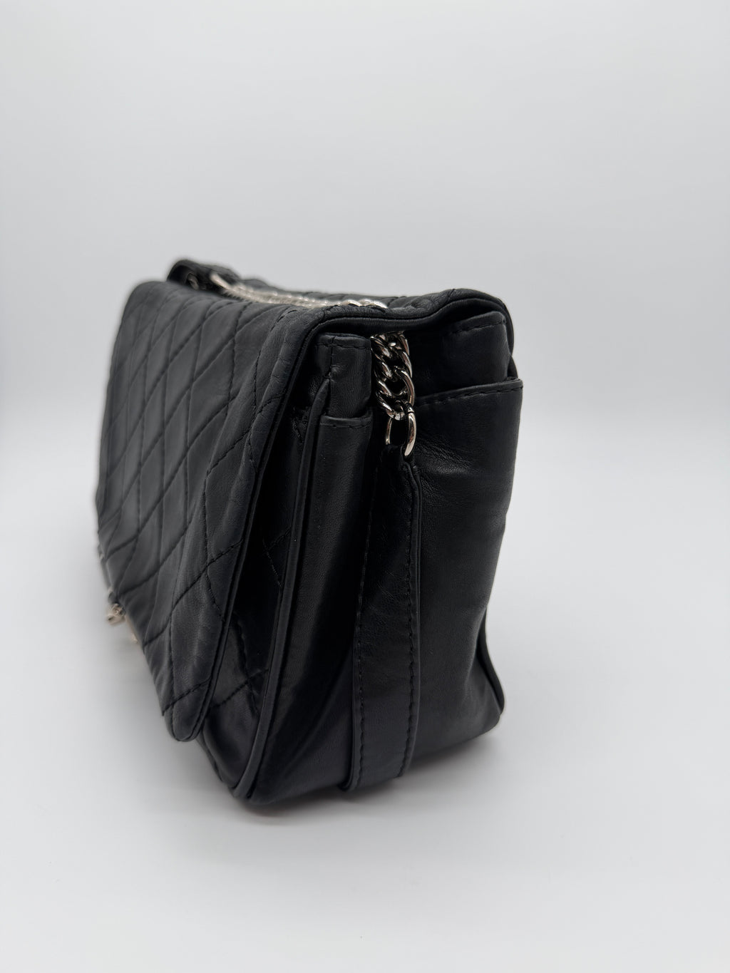 Chanel Secret Flap in Black Lambskin