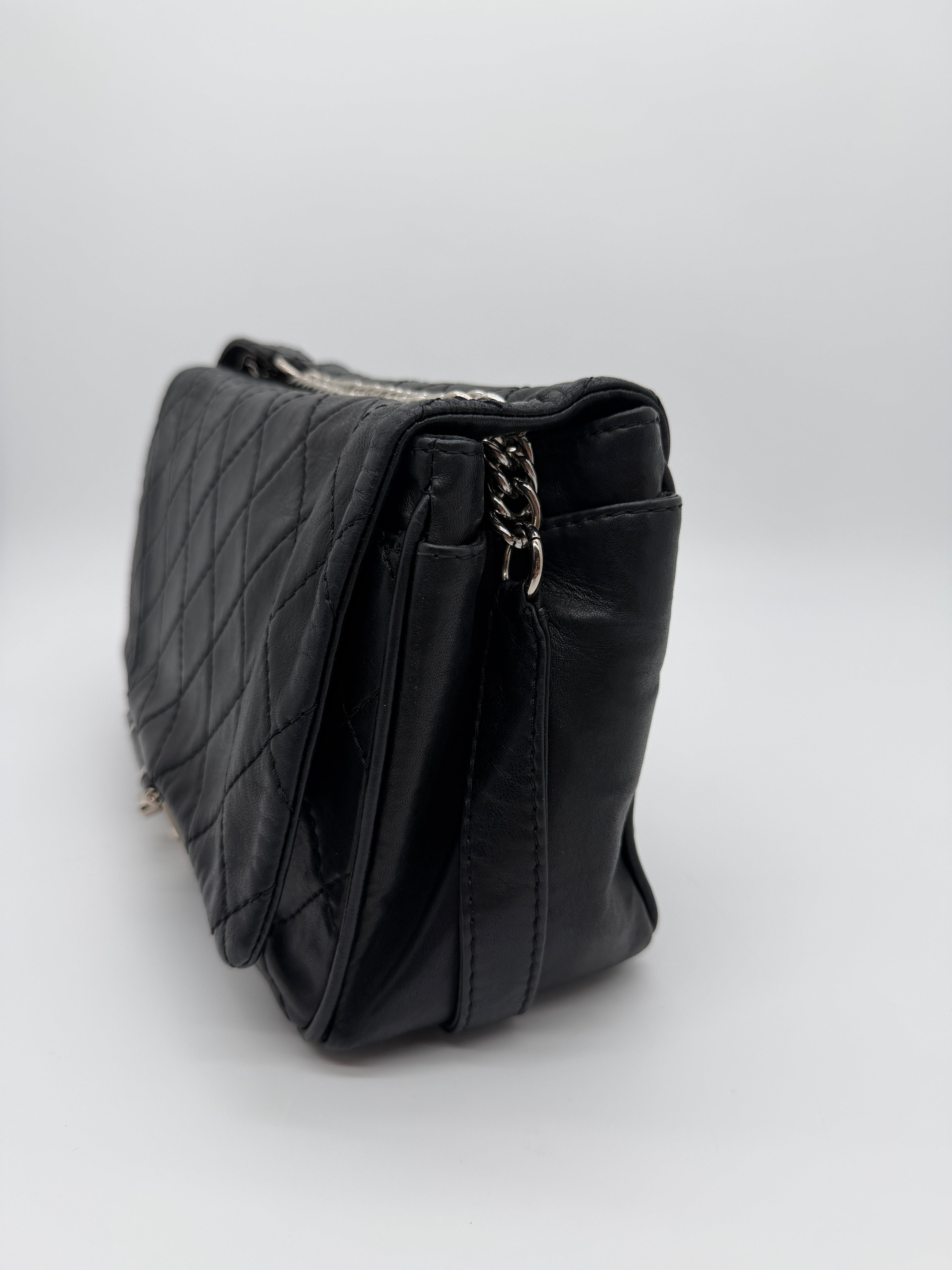 Chanel Secret Flap in Black Lambskin