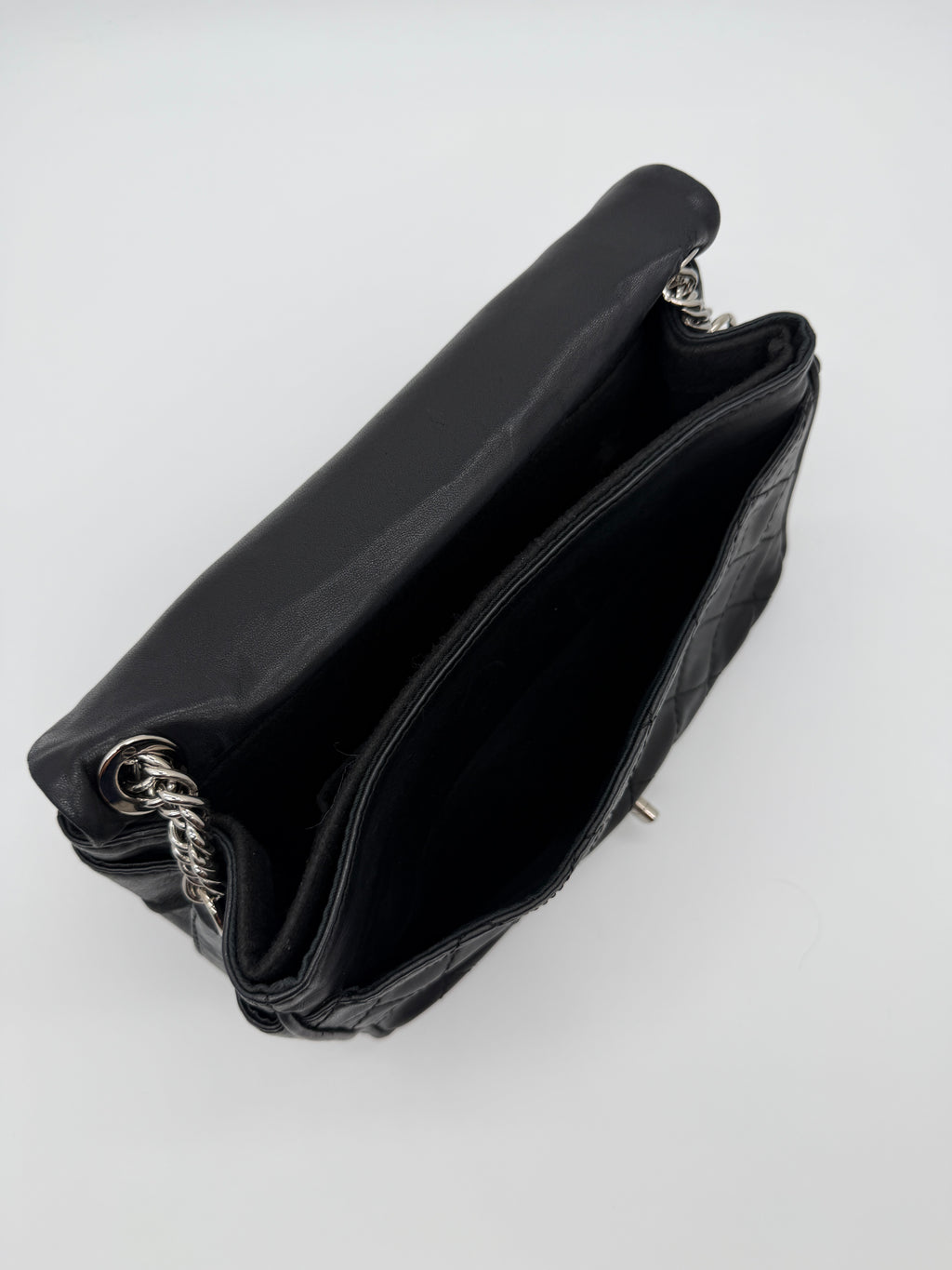 Chanel Secret Flap in Black Lambskin
